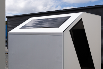 exterior photo of unique sky light roof and side window on sky spacee office pod.