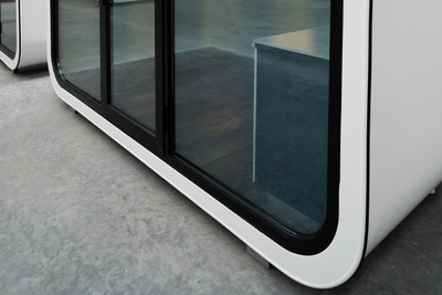 Eat Spacee design exterior in white with mirrored glass doors and black door frames showing Spacee footing.