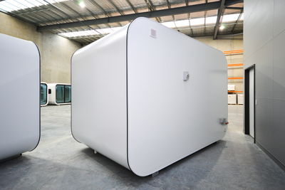Rest Spacee design exterior in white showing back view with waterproof power plug and ventilation.